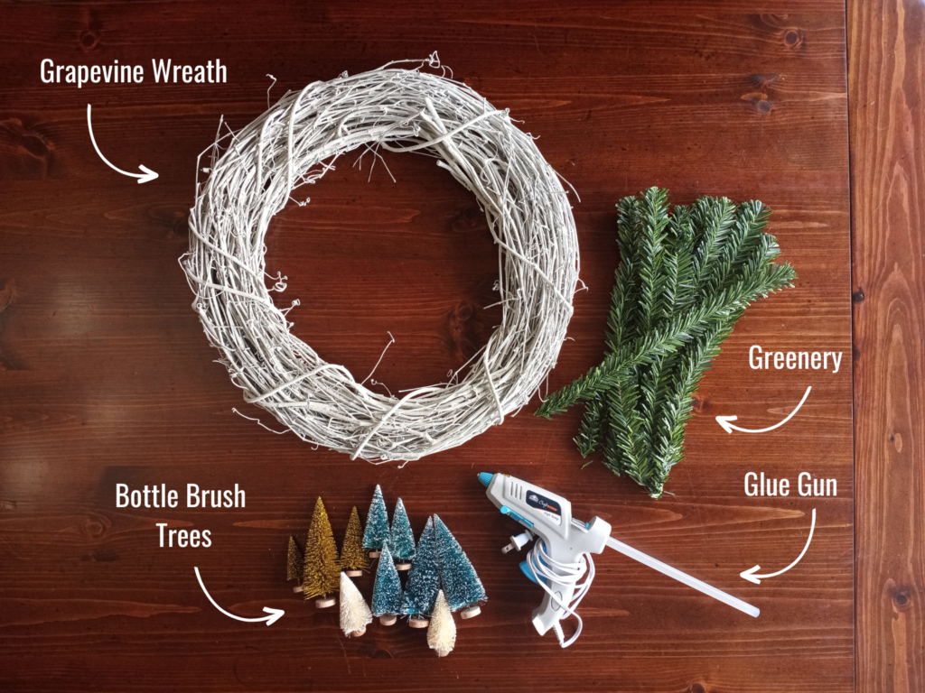 The materials used to make a grapevine bottle brush wreath.